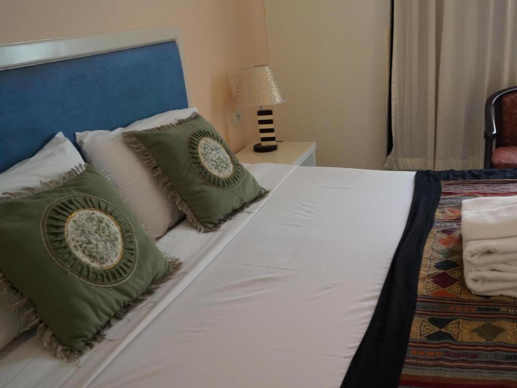 Seng Aroun Hotel Paksze Kültér fotó